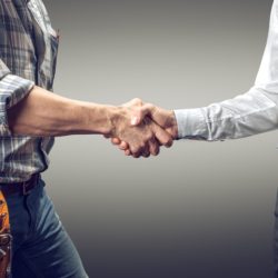 A Contractor And An Employer Shake Hands
